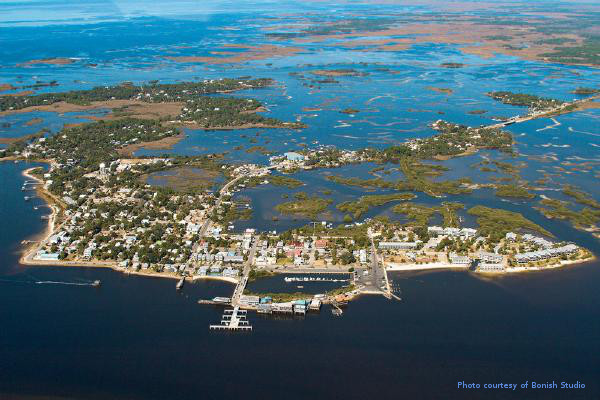 Aerial view of Cedar Key, Florida coastal town surrounded by water